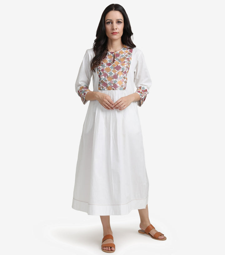 Natural embroidered cotton dress