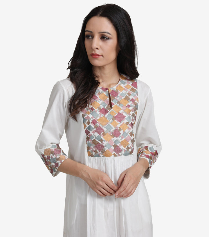 Natural embroidered cotton dress